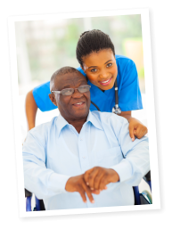 Old man in a wheelchair with his nurse